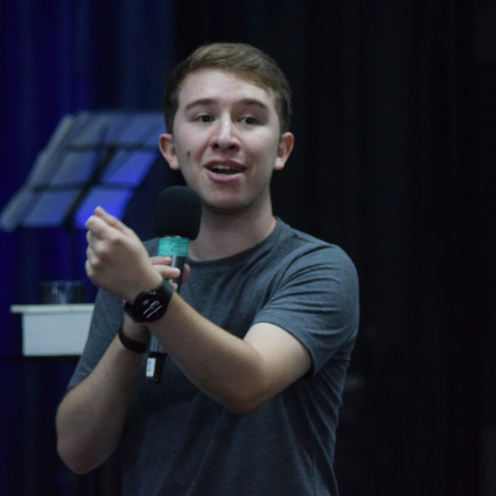 Josué Ochoa interpreting at a live conference